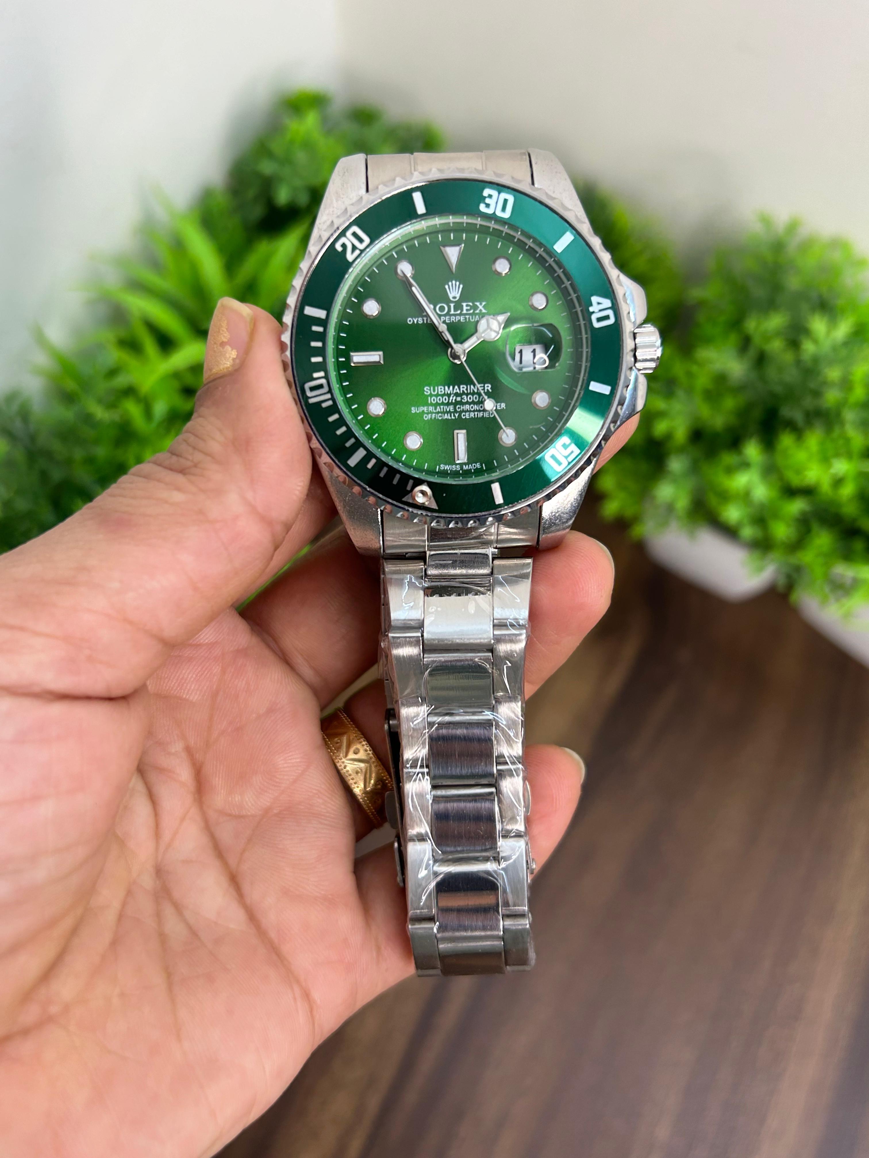 ROLEX SUBMARINER GREEN WITH SILVER CHAIN