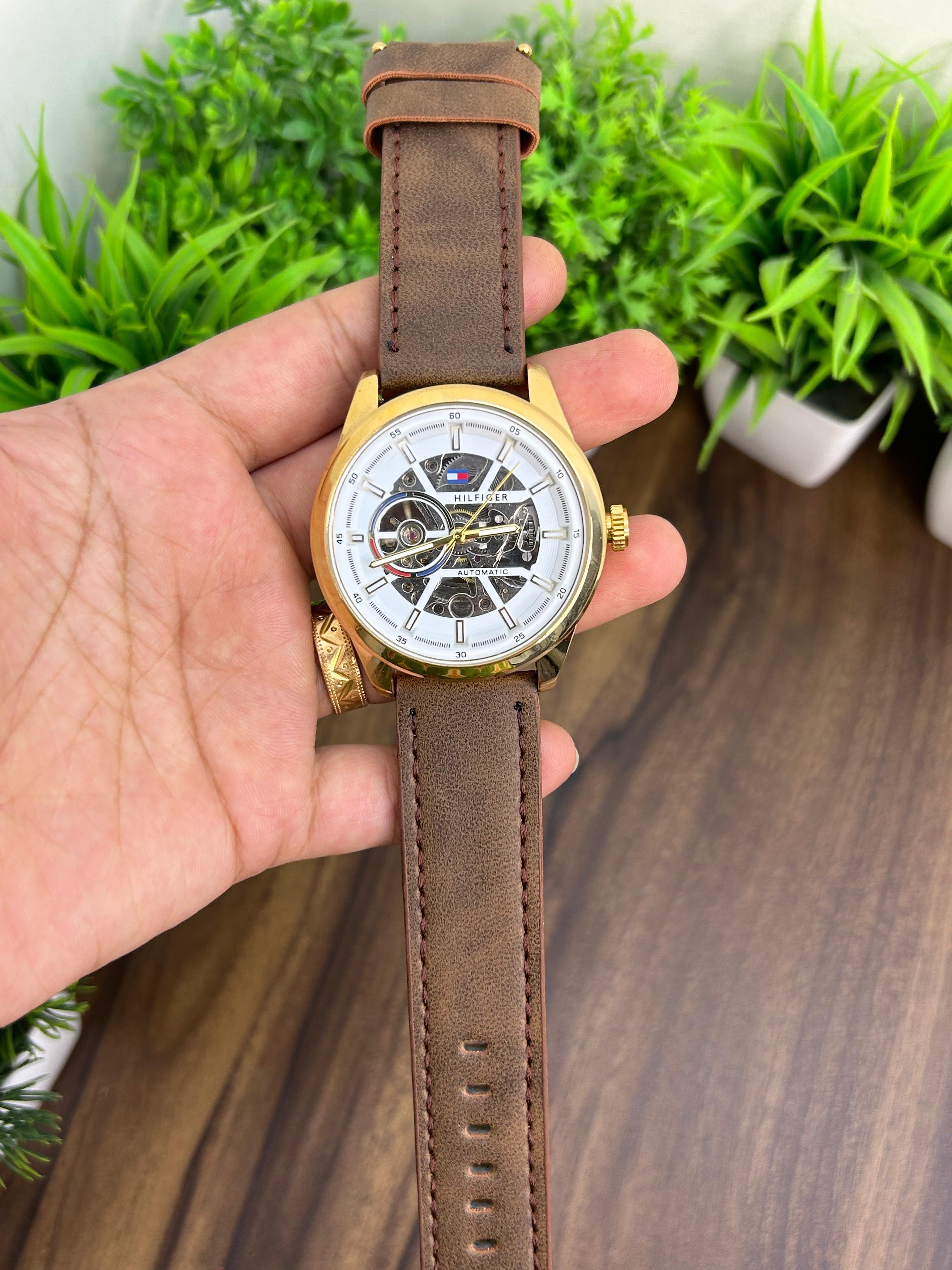 TOMMY HILFIGER AUTOMATIC, BROWN STRAP WHITE DIAL GOLD BODY 7006