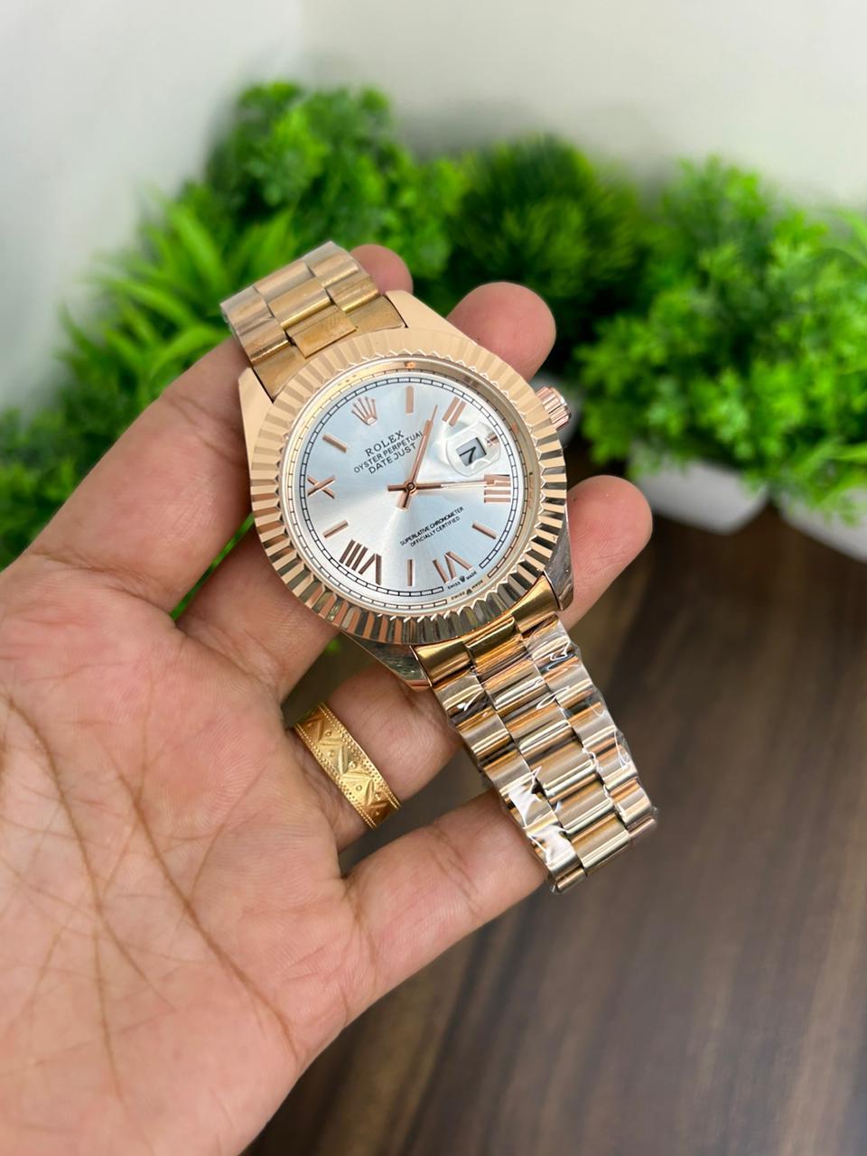 ROLEX, WHITE WITH ROSE GOLD CHAIN