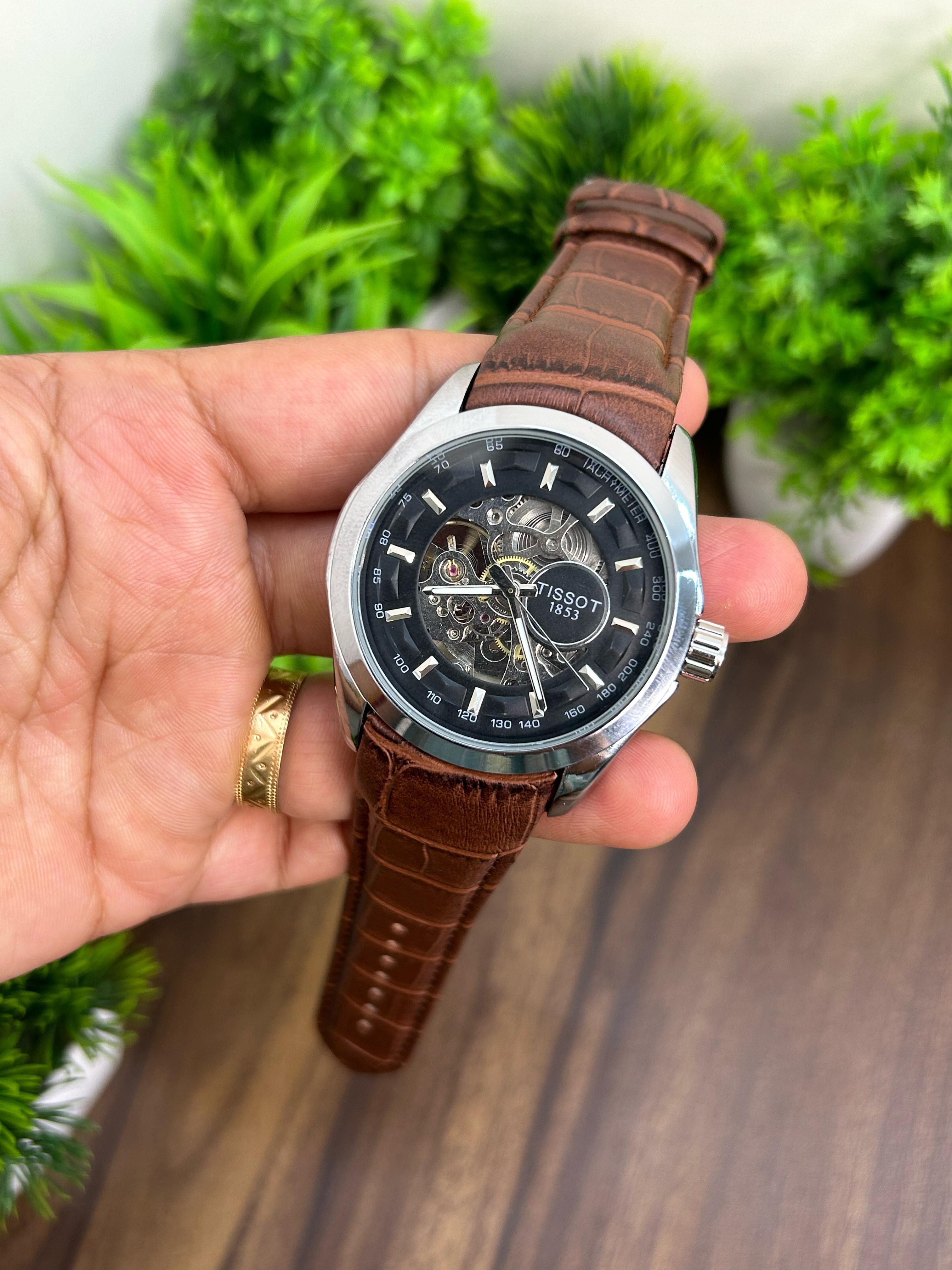 TISSOT AUTOMATIC, SILVER WITH BROWN STRAP