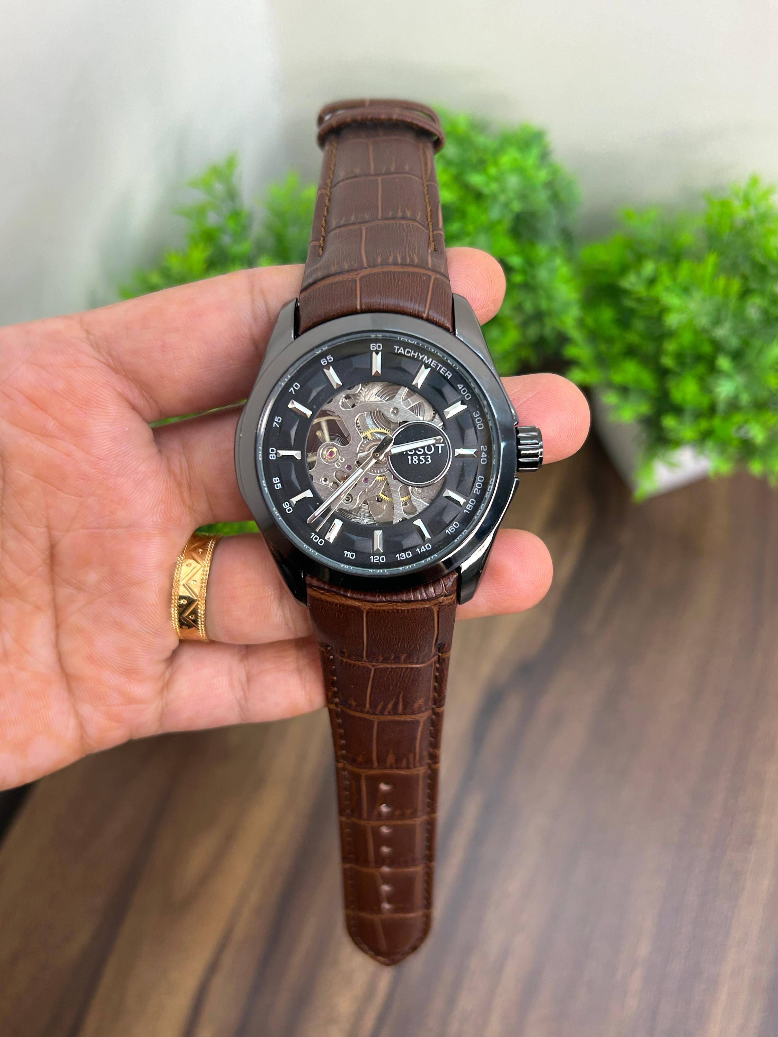 TISSOT AUTOMATIC SKELETON, BLACK DIAL WITH BROWN STRAP