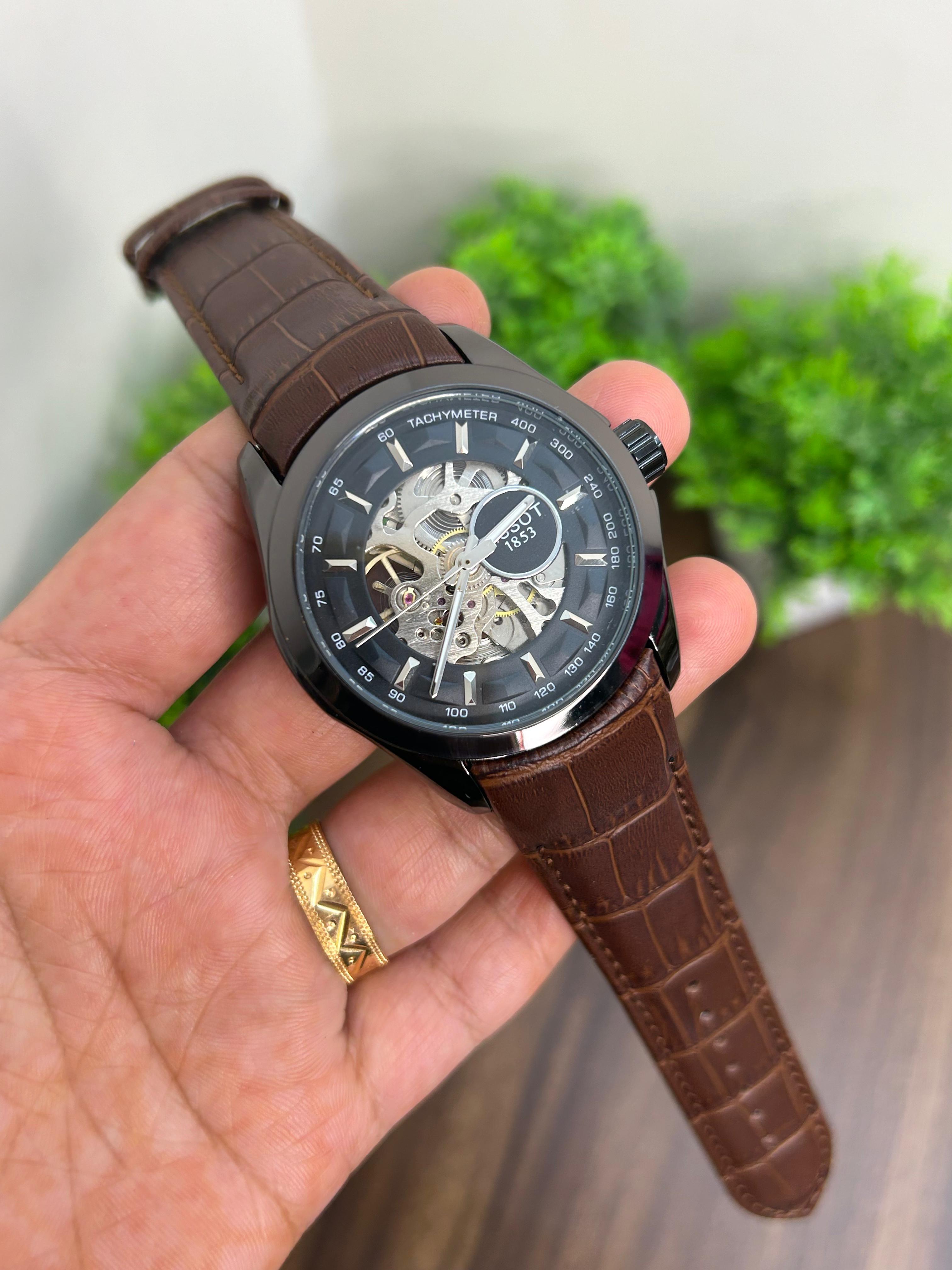 TISSOT AUTOMATIC SKELETON, BLACK DIAL WITH BROWN STRAP