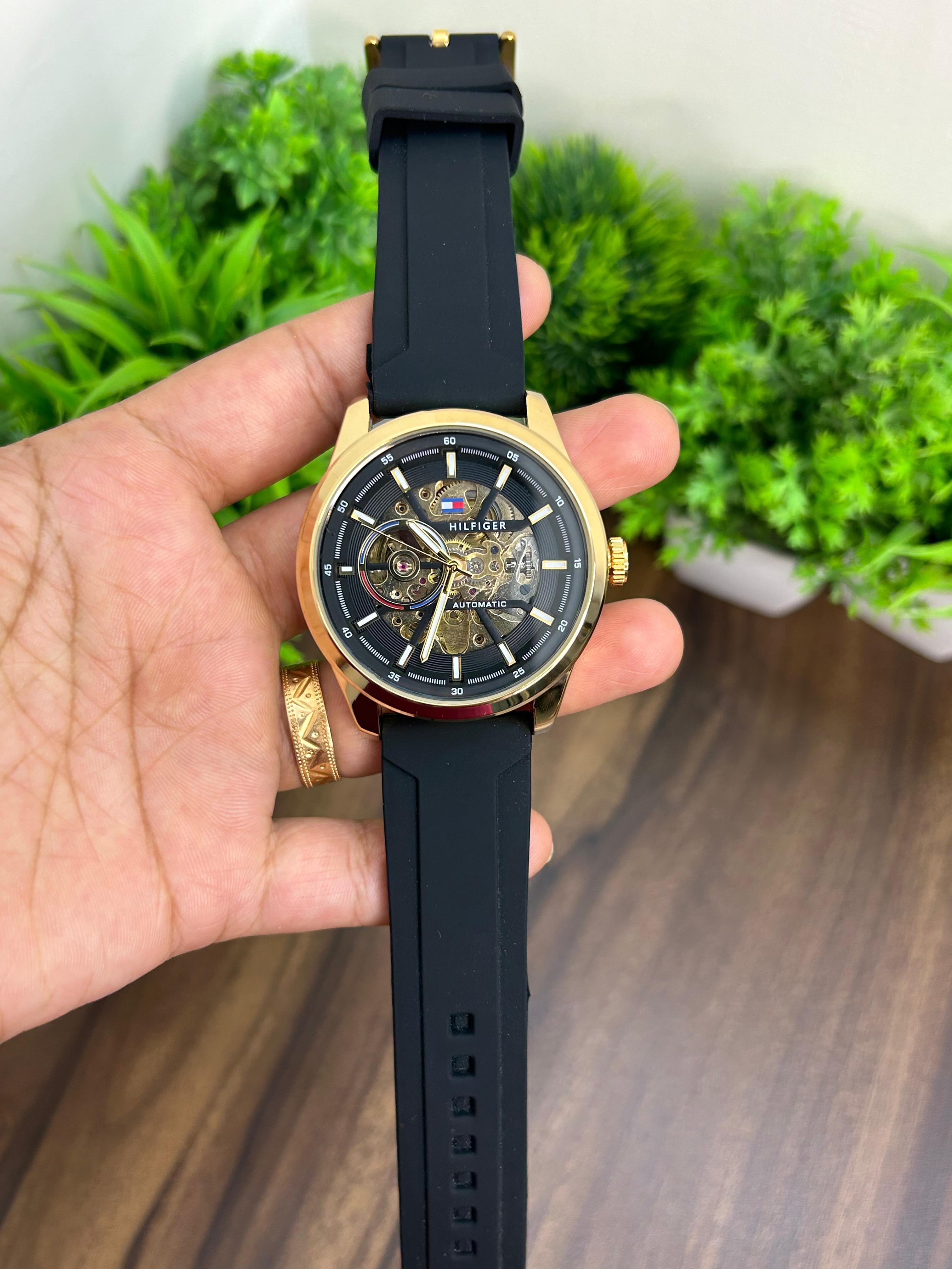 TOMMY HILFIGER AUTOMATIC, GOLD WITH BLACK STRAP