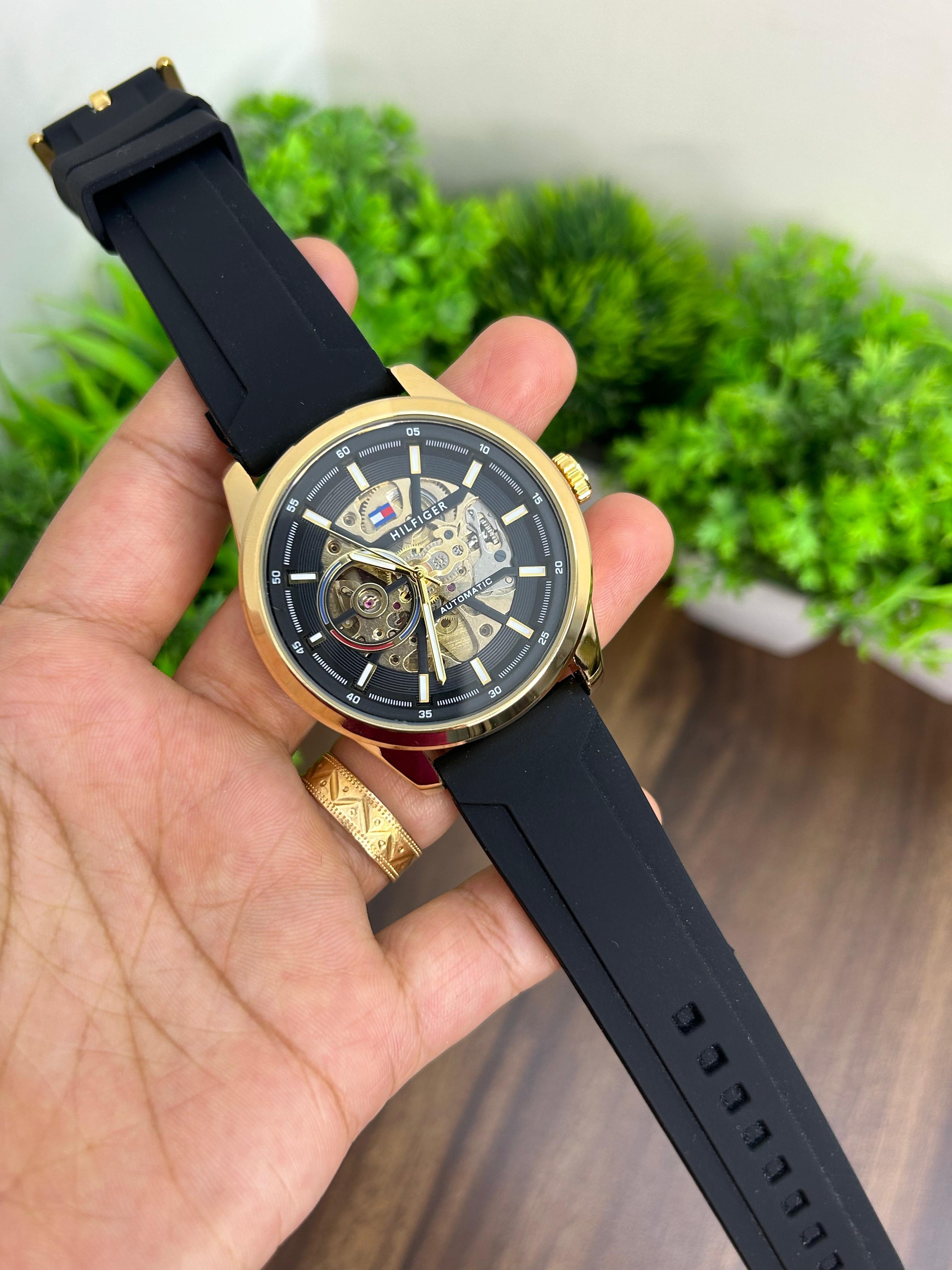TOMMY HILFIGER AUTOMATIC, GOLD WITH BLACK STRAP