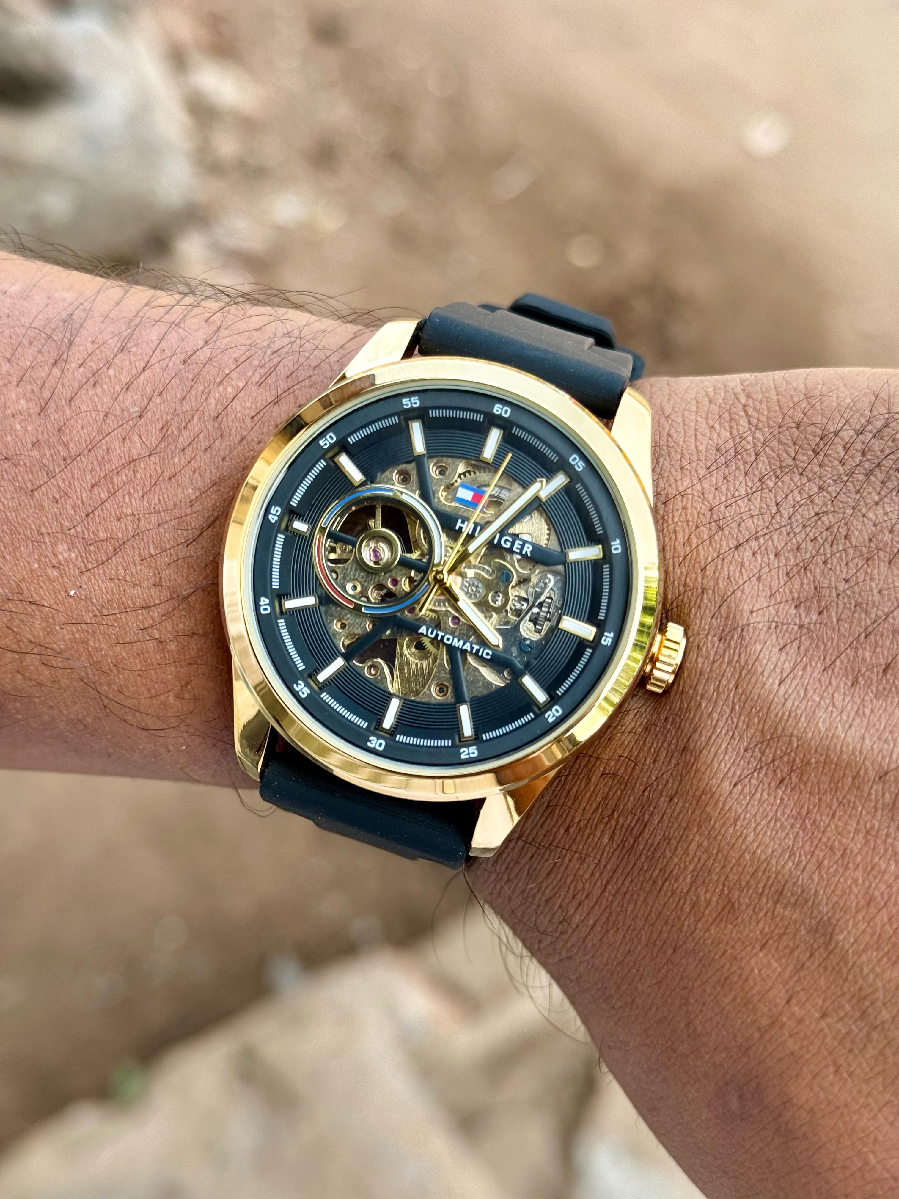 TOMMY HILFIGER AUTOMATIC, GOLD WITH BLACK STRAP