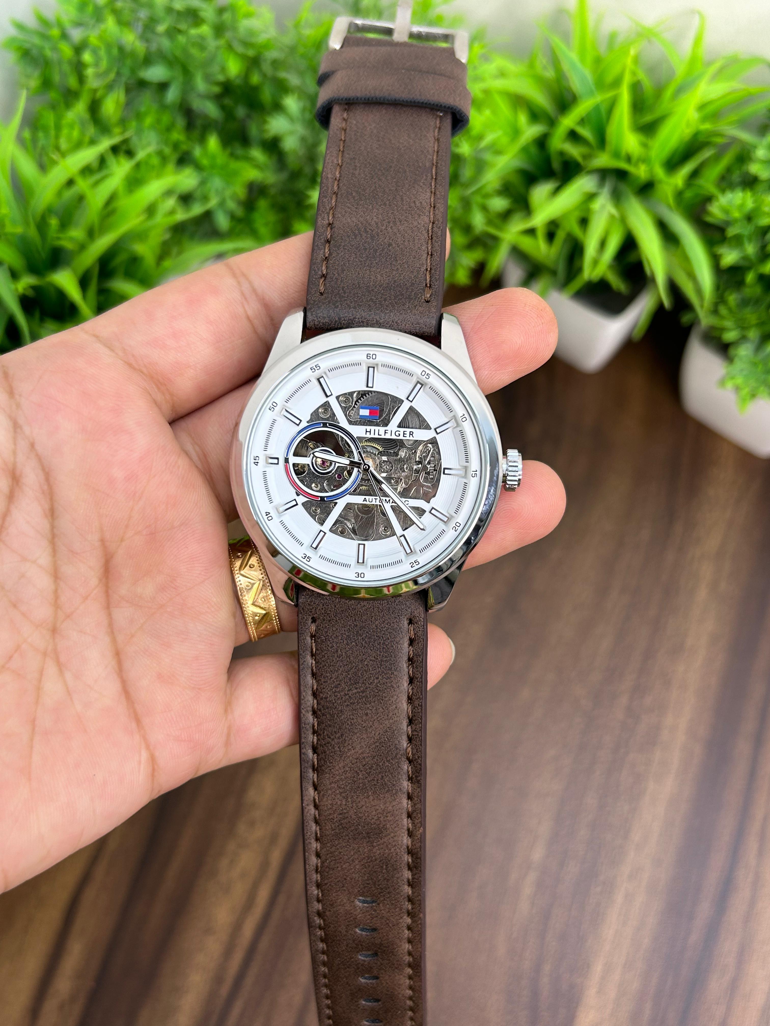 TOMMY HILFIGER, WHITE WITH BROWN LEATHER STRAP