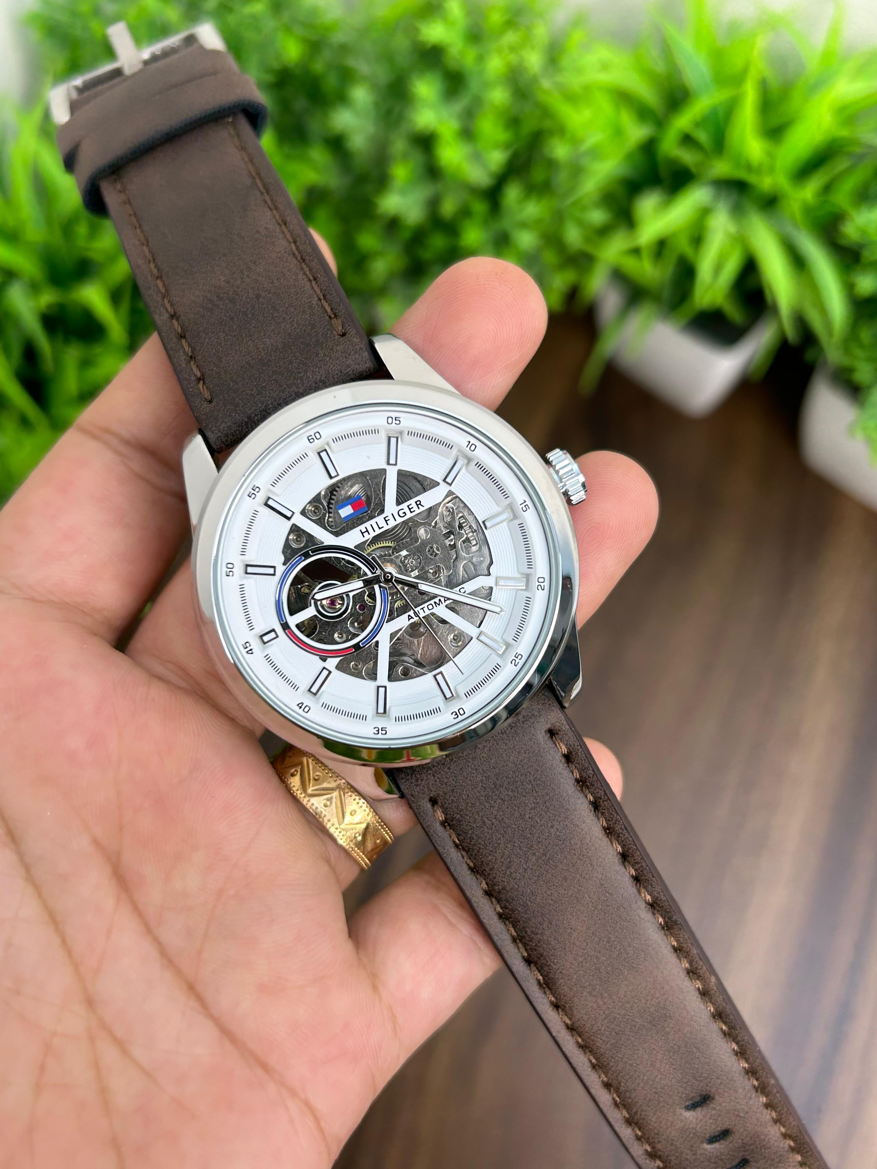 TOMMY HILFIGER, WHITE WITH BROWN LEATHER STRAP