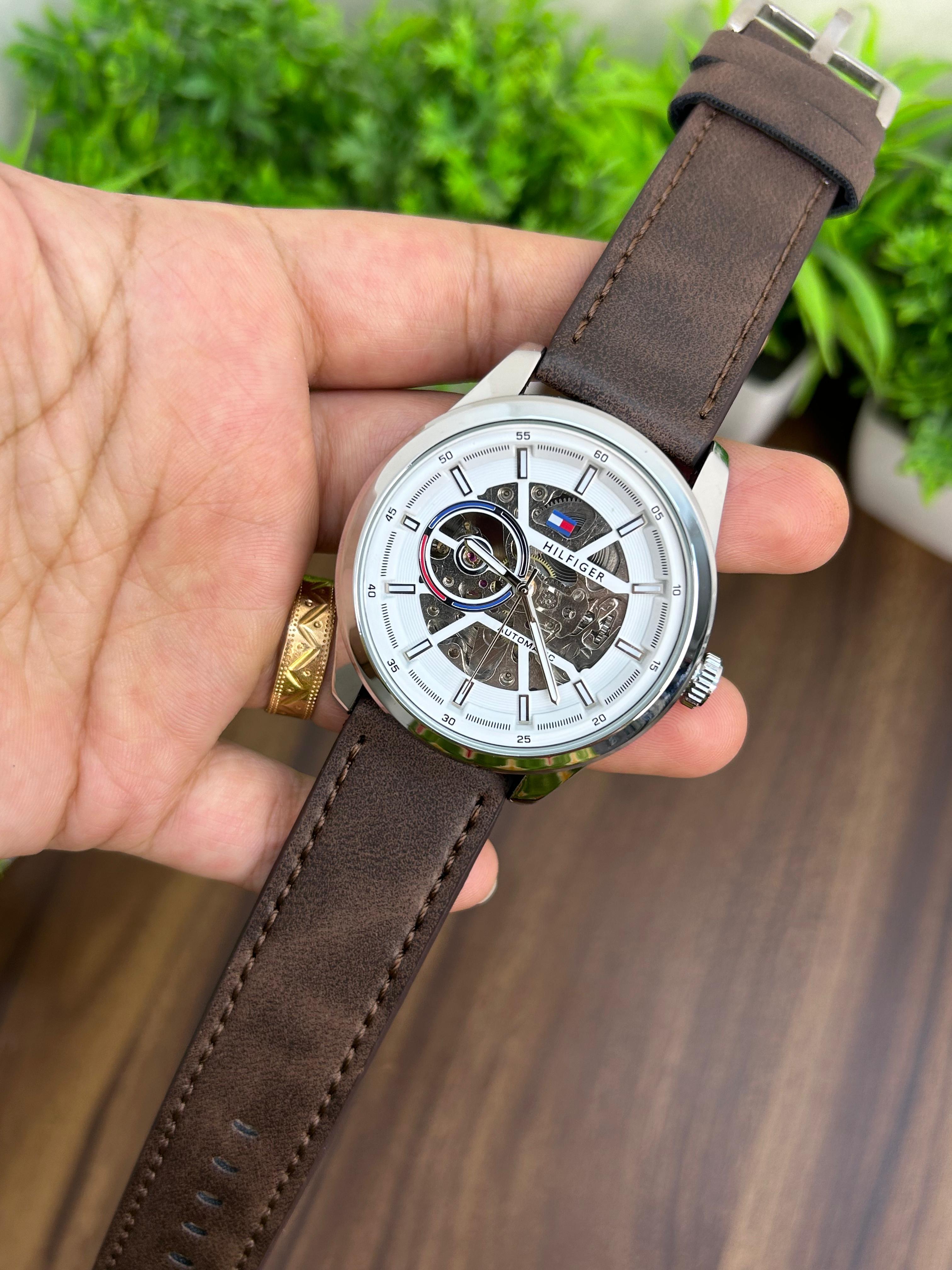 TOMMY HILFIGER, WHITE WITH BROWN LEATHER STRAP